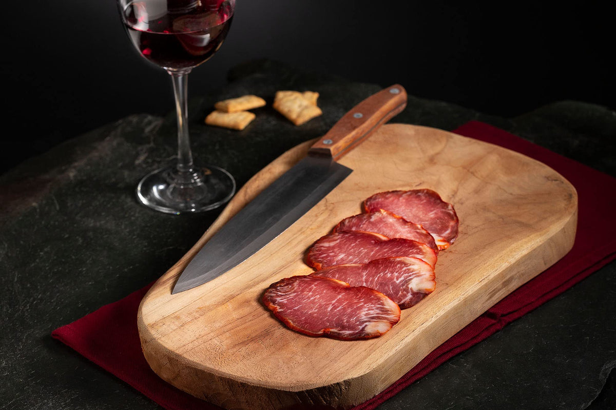 FERMIN thin-slices Iberico pork loin 2oz laid out for tapas and tasting.