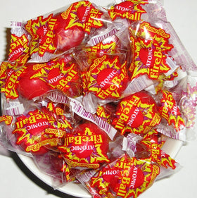 Ferrara Atomic FireBall candy 2lb bag with round red hard candies for sharing.