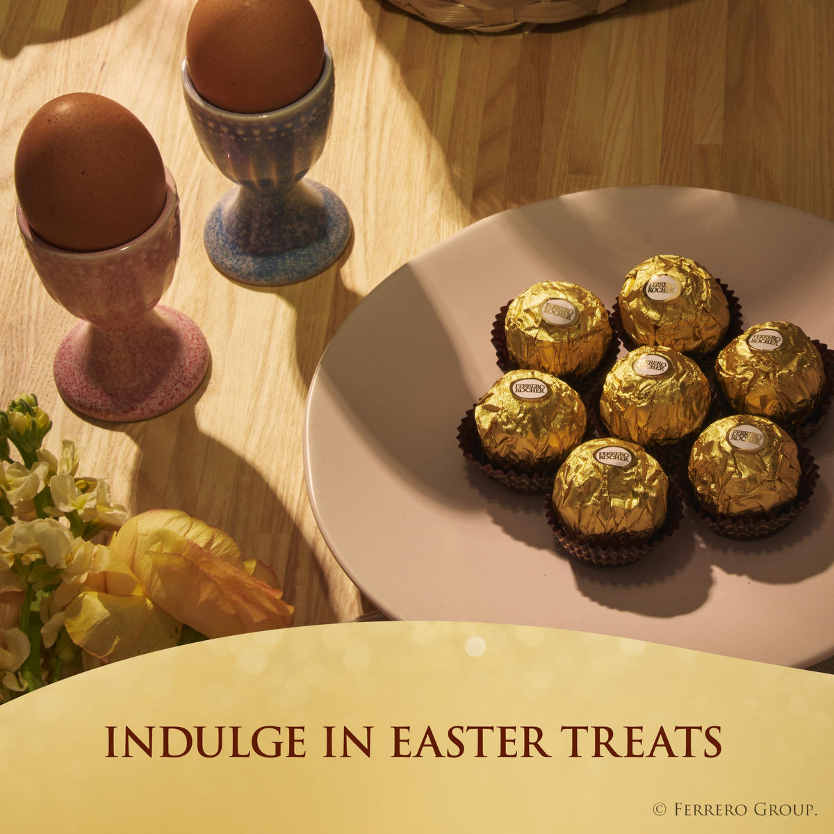 Close-up of Ferrero Rocher golden wrapper highlighting luxury hazelnut chocolate.
