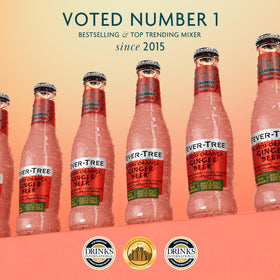 Fever-Tree Blood Orange Ginger Beer in a glass served over ice enhances mocktails.