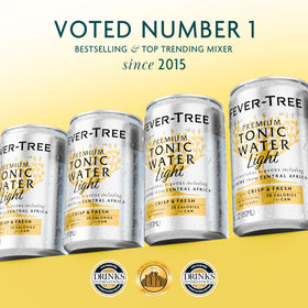 Fever-Tree Light Tonic Water in a glass with lime, ideal for cocktails.