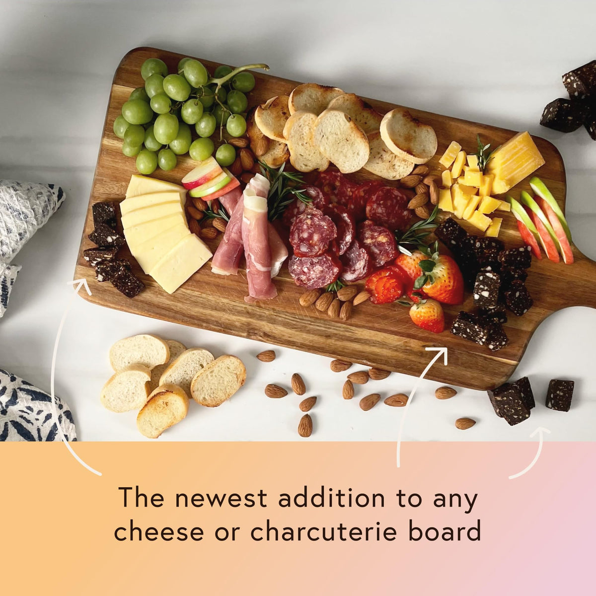 Fichi on a serving board with wine emphasizes pairing.