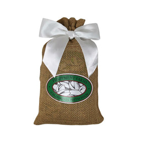 Fiddyment Farms pistachios in beige burlap bag ready for snacking.