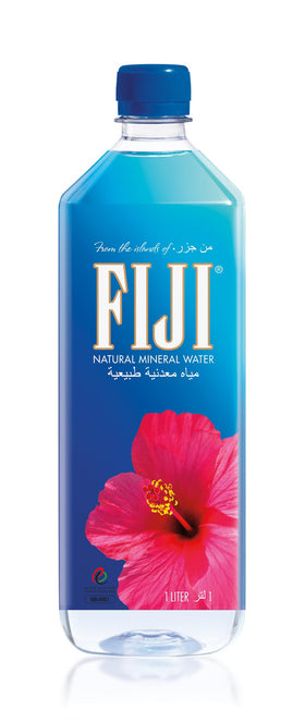 FIJI Artesian Water bottles on a desk setup for daily use