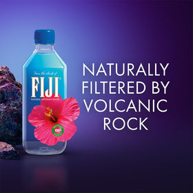 FIJI Water bottle on a desk supports steady daytime hydration.