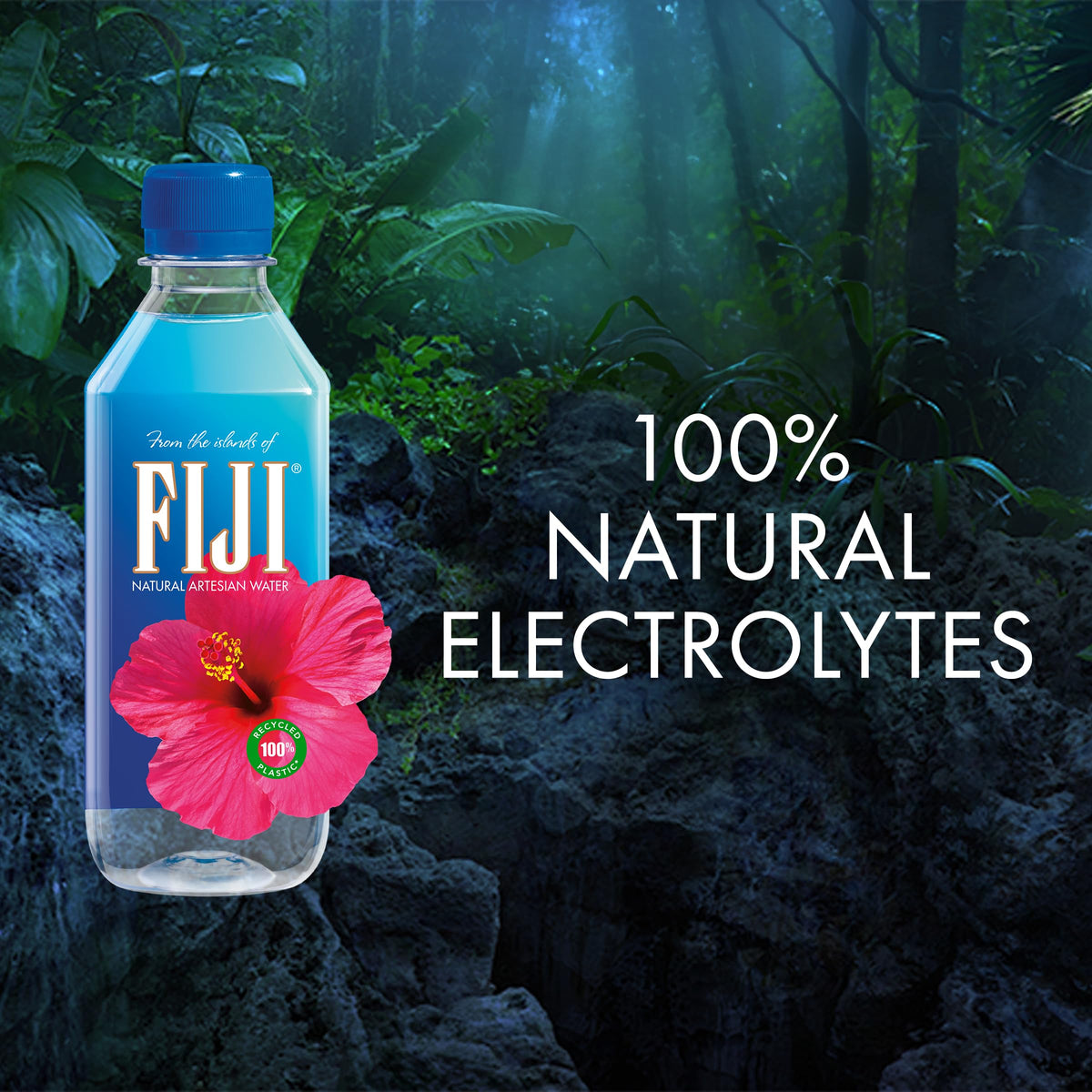 FIJI Water bottle with ice in a tall glass, crisp hydration.