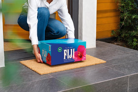 FIJI Water on an event table, ideal for gatherings and meals.