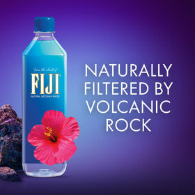 Outdoor hiker with FIJI Water during activity for sustained hydration.