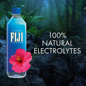 FIJI Water poured into a glass for a refreshing moment after exercise.