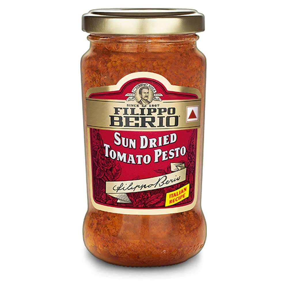 Filippo Berio Sun Dried Tomato Pesto jar for rich, authentic flavor in pasta sauces.
