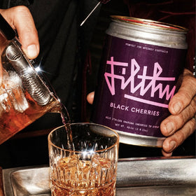 Filthy Amarena cherries close-up shows deep color and rich depth for cocktails.