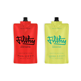 Filthy Food Margarita Mix bottle close-up, bold lime flavor for at-home cocktails.
