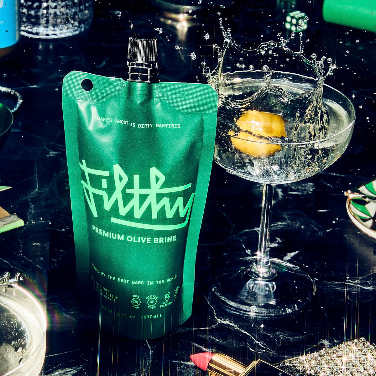 Filthy Food olive brine pour highlights smooth pour for perfect dirty martinis.