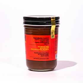 Fine and Raw dark chocolate hazelnut butter spoonful enhances ice cream or waffles.