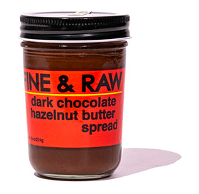 Fine and Raw hazelnut butter spread in a jar with dark chocolate for a less sweet treat.