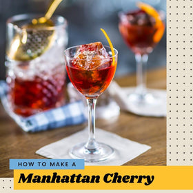 Finest Call cherry syrup being poured into a glass for cocktails.