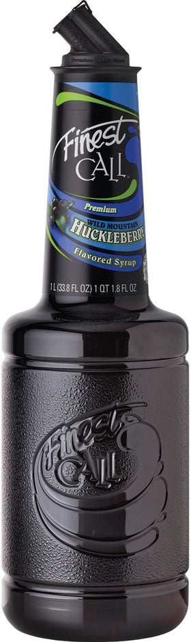 Finest Call huckleberry syrup bottle closeup, rich color ideal for cocktails.