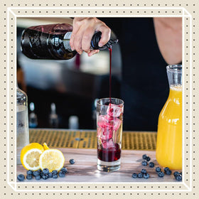 Consistent flavor and yield showcased by Finest Call huckleberry syrup bottle.