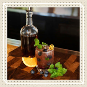 Pouring-closure in action shows precise pours with Finest Call huckleberry syrup.
