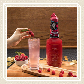 Finest Call passion fruit puree bottle enhances premium cocktails