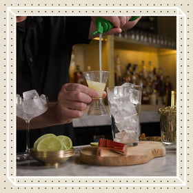 Finest Call Premium Lime Juice Bottle Pouring for precise, rapid bar prep.