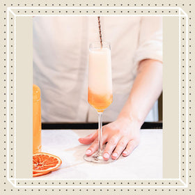 Finest Call white peach puree pour close-up for accurate pours.