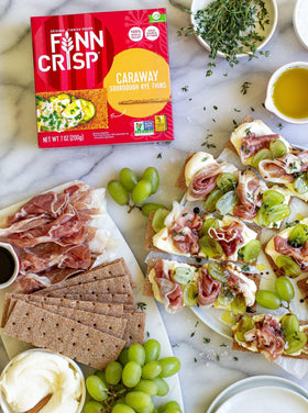 Finn Crisp Caraway Sourdough Rye Thins in a bright kitchen scene.