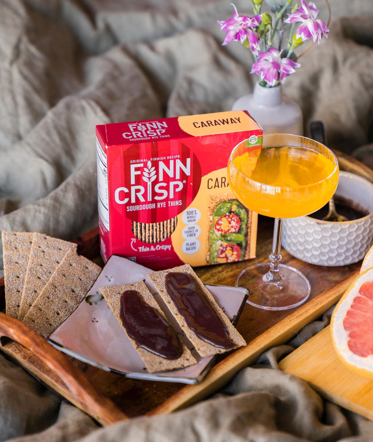 Finn Crisp Caraway Sourdough Rye Thins pack of 9 boxes for convenient snacking.