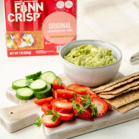 Finn Crisp Rye Crispbread arranged on a charcuterie board for entertaining.