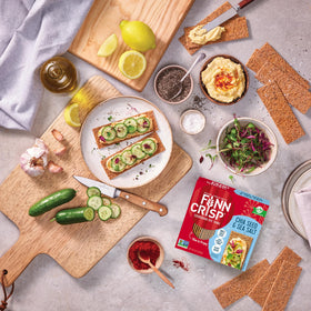 Finn Crisp rye thins stacked to show thin, crunchy texture