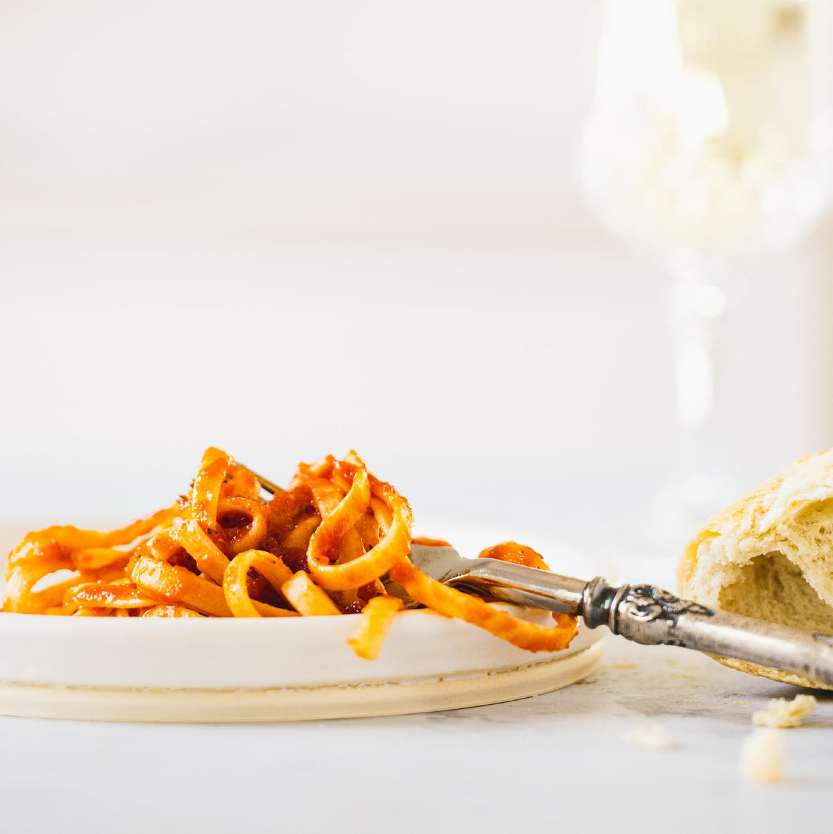 Family dinner with Fiorella's Fra Diavolo sauce and pasta