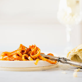 Family dinner with Fiorella's Fra Diavolo sauce and pasta