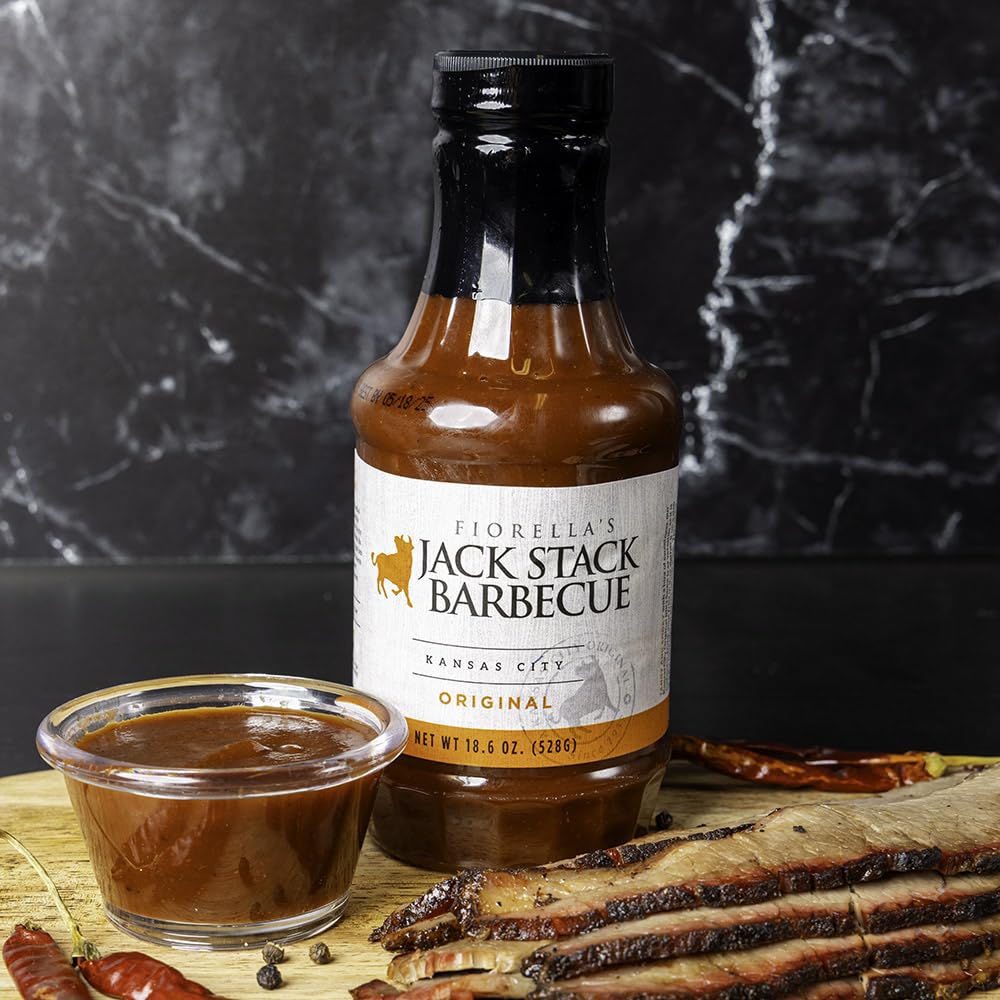 Brisket plated with Fiorella's Jack Stack Original Sauce finishing touch