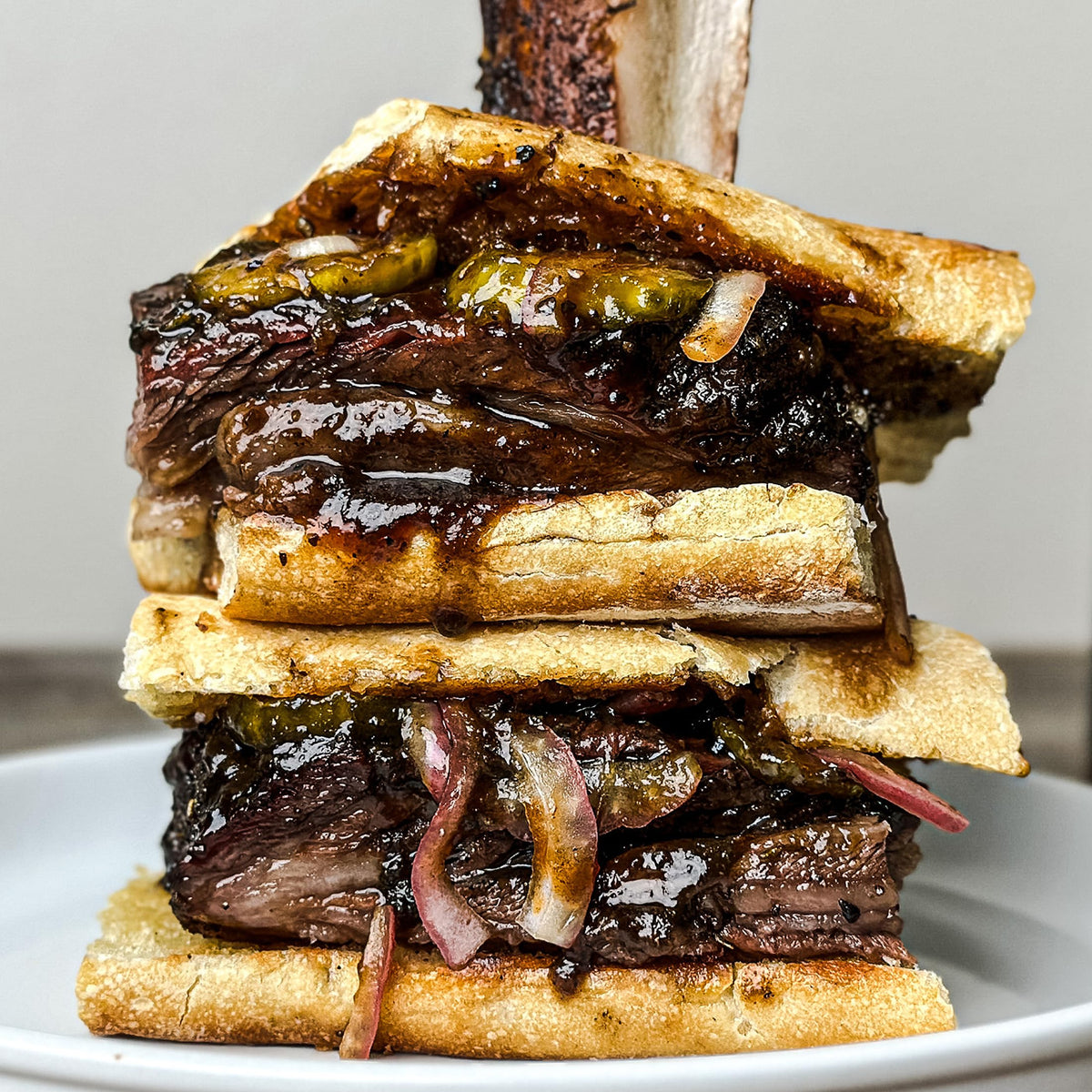 Family-style platter of steaks with a crust from Black & Tan seasoning.