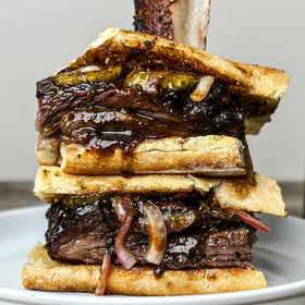 Family-style platter of steaks with a crust from Black & Tan seasoning.