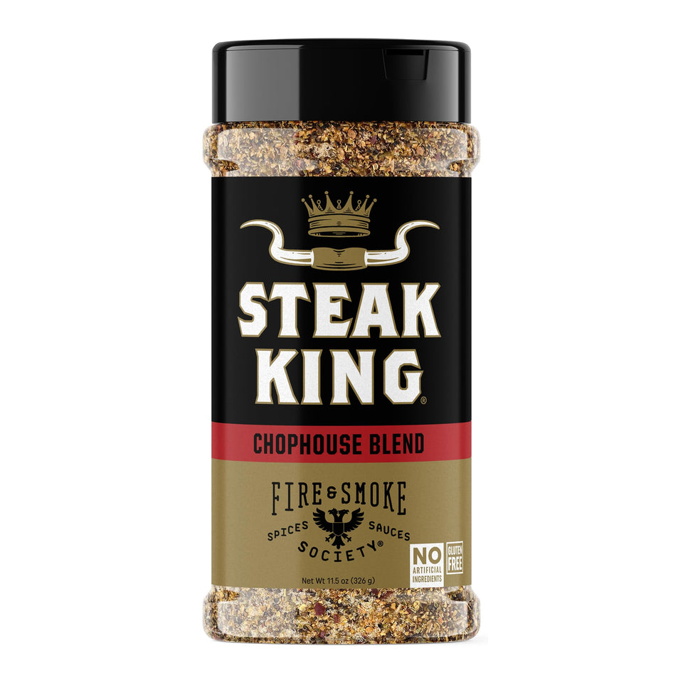 Fire & Smoke Society Steak King seasoning bottle on the counter for bold steak flavor.