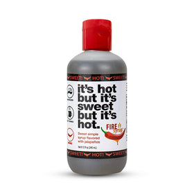 Fire Syrup bottle pouring for a spicy-sweet drizzle on cocktails