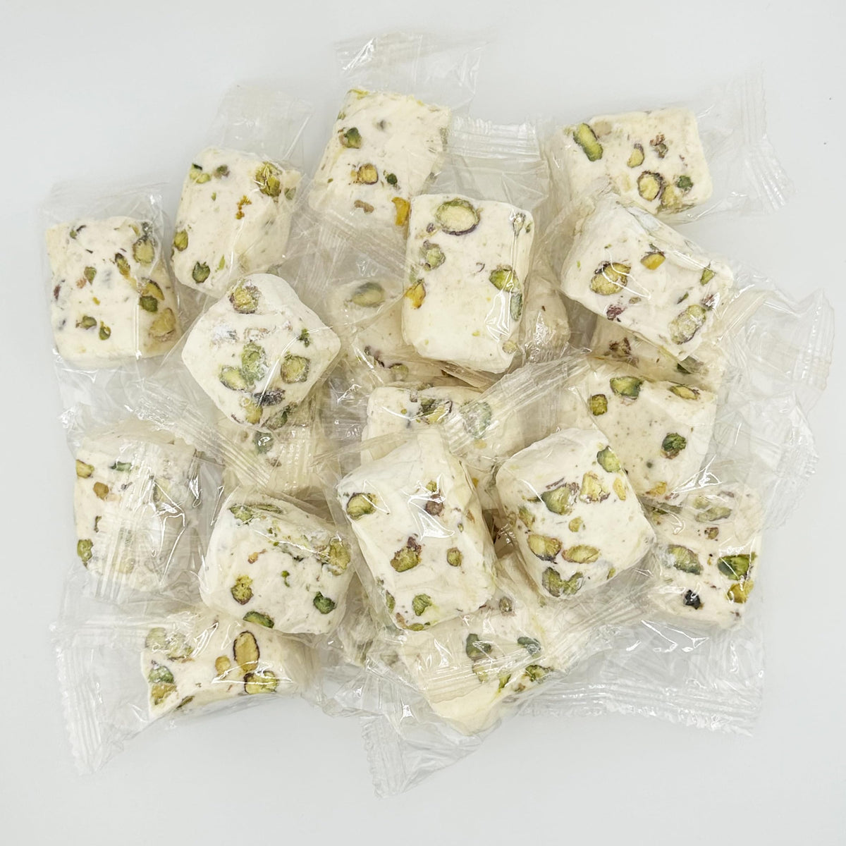 FirstChoiceCandy soft white nougat with pistachio nuggets in a shareable 2lb pack.