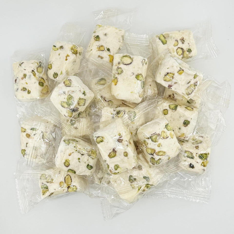 FirstChoiceCandy soft white nougat with pistachio nuggets in a shareable 2lb pack.