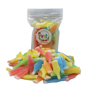 FirstChoiceCandy wax bottles liquid closeup with fruity flavors for dessert buffets.