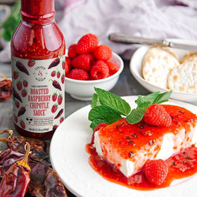 Fischer & Wieser Original Raspberry Chipotle sauce on a plated dish, ideal for glazing meats