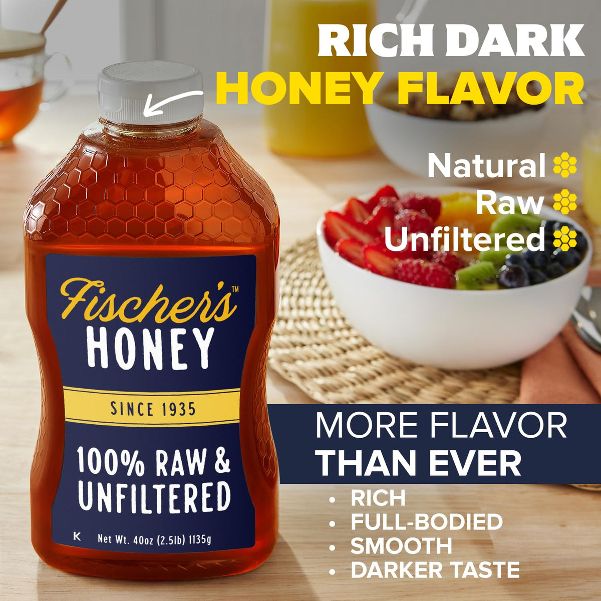 Fischer's honey being stirred into tea for fragrant sweetness