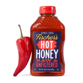Fischer's Hot Honey bottle pour adds savory sweet heat to pizzas