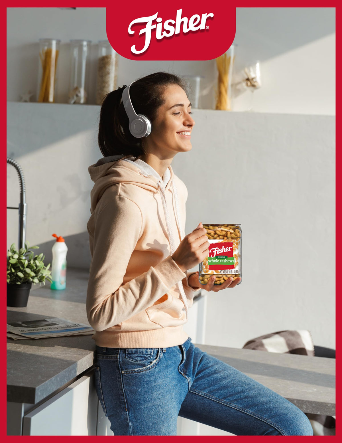 Pouring Fisher Snack Premium Whole Cashews from the canister for busy days