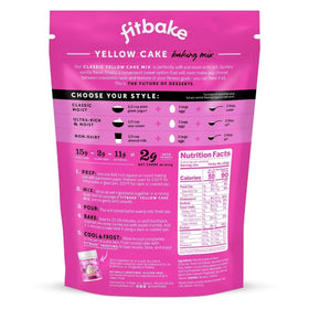 FitBake yellow cake mix batter being poured from a bowl for quick keto baking.