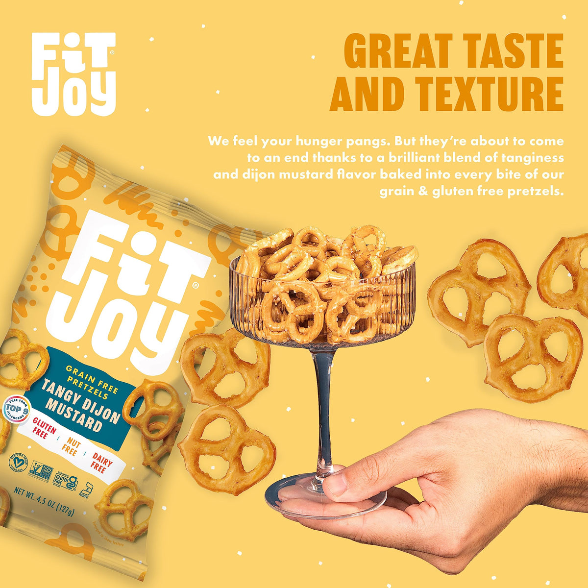 FitJoy Tangy Dijon Pretzels crunch close-up highlights bold flavor.