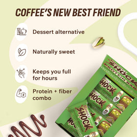 Fitness SHOCK pistachio chocolate bar front view emphasizes real pistachios and indulgent chocolate.