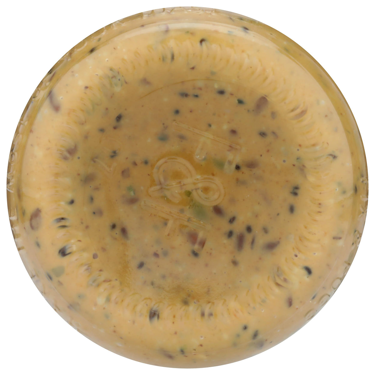 Spoonful of Fix & Fogg Everything Butter ready for a quick, protein-rich snack.