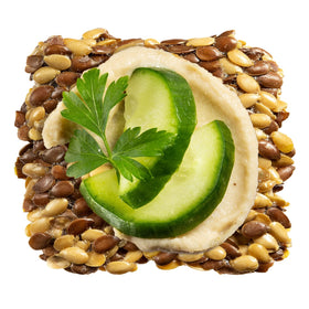 Flackers high-fiber crackers in a bowl, fiber-rich snacking option.