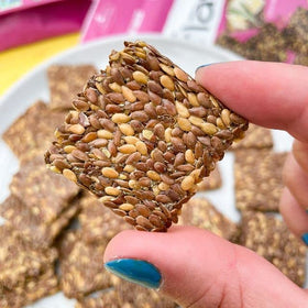Flackers organic flaxseed ingredients highlighted on packaging.